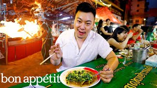 We Tried Bangkok’s Explosive Fire Wok Stir Fry  Street Eats  Bon Appétit [upl. by Dry839]