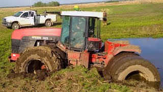 Powerful tractor got stuck in mud Heavy agricultural machinery works offroad [upl. by Androw]