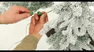 Assembly instructions of Glitzhome 10ft Deluxe PreLit Flocked Fir Artificial Christmas Tree [upl. by Centonze920]