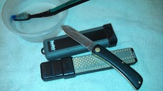 Freehand knife sharpening using Smiths 4 inch diamond combination stone [upl. by Itnaihc502]