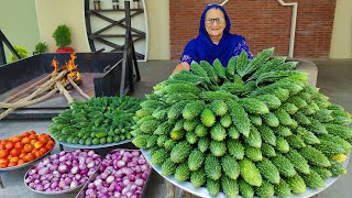 Karela Cooked In Our Traditional Style  Bitter Gourd Recipe  Village Cooking Recipe [upl. by Acirre]