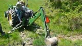 Banu runs the John Deere Backhoe on the farm [upl. by Malissa361]