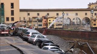 Dozens of of parked cars are swallowed up in massive road collapse along river in Florence [upl. by Higginson]