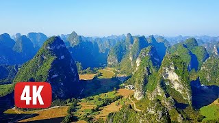 DAXIN Guangxi  Magical Karst Mountains Stunning View by DRONE in 4K MUST SEE [upl. by Nyrehtac828]