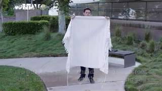 How to put on a tallit [upl. by Yatnahs]