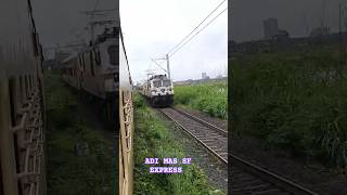 Train to Rajasthan crossing Train to Chennai at Vasai curve [upl. by Prosser]