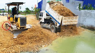 New Updating Project Landfill in Flooded Pond by KOMATSU D20A amp Truck 5T Pushing Stone Into water [upl. by Neros623]