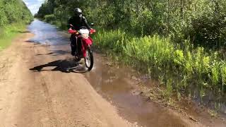 Honda CRF250L going through nature’s automatic car wash [upl. by Erminie437]