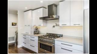 White gloss kitchen cabinets design [upl. by Ahsekram]