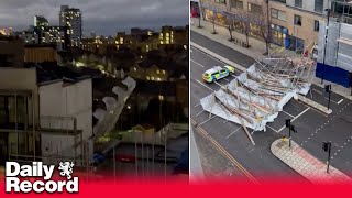 Storm Henk The moment scaffolding falls off back of a building as weather wreaks havoc in London [upl. by Nezam]