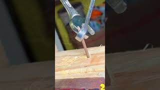 the process of bending a nail nails factoryworker woodworking [upl. by Erny]