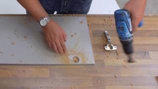 How to drill hinge hinge holes in kitchen doors  Kitchen Warehouse UK LTD [upl. by Atiuqehs]