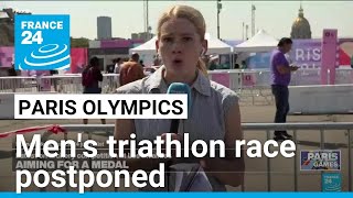 Mens Olympic triathlon race postponed over Seine pollution levels • FRANCE 24 English [upl. by Kone]