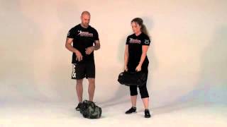 How to Properly Perform Ultimate Sandbag Training Power Clean [upl. by Nylcsoj]