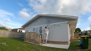 Second coat Exterior airless spray painting gable end sprayshield [upl. by Noli]