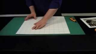 Mounting a photo or print by hand onto self adhesive board [upl. by Coffey]