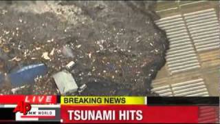 unnaturally moving object At the crest of the tsunami wave Japan 11 03 2011flv [upl. by Willing]