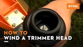 How to Wind a STIHL Trimmer Head  How To [upl. by Lahcym853]