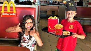 Kids pretend play working at McDonalds with surprise toys [upl. by Esmond159]