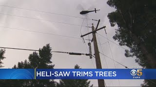 PGampE Using HighPowered HeliSaw To Trim Trees Away From Power Lines [upl. by Llener105]