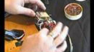 How to Replace A Guitar Pickguard and Pickups Part 1 [upl. by Ahseiyn460]