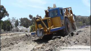 Pair of 657E scrapers amp 973C track loader [upl. by Emerick]