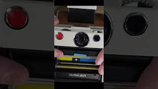 Polaroid SX70 Film Pack Loading Short [upl. by Max438]