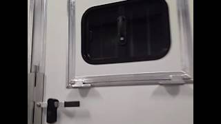 Drop Down Window on the Rear Load Door  Lakota Horse Trailers [upl. by Nyrek]