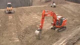 Construction Equipment working on a Gas Well Pond [upl. by Lyrac359]