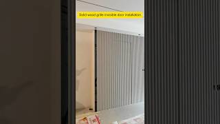 Solid wood grille invisible door installation interiordesign shorts alshaheentech [upl. by Llewkcor]