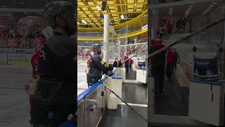 Hockey player is choosing his stick during the warm up [upl. by Naziaf]