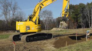 Komatsu PC228US Grading Ditch [upl. by Nanreit]