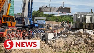 Penang warehouse collapse Rescuers battling to remove 33tonne beam to reach victims [upl. by Jesselyn346]