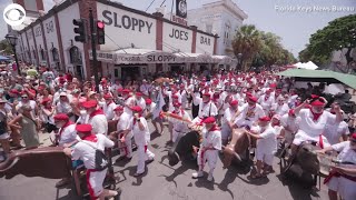 Hemingway lookalikes spoof Running of the Bulls in Florida [upl. by Pritchett]