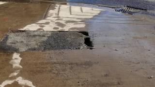 Water draining into Bell Fibre Optic cable Installation Thunder Bay sidewalk [upl. by Aela]