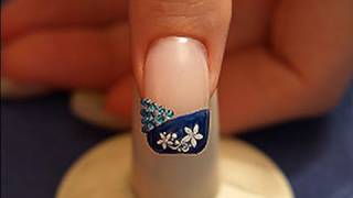 Strass stones and nail lacquer in blue for a French motive [upl. by Ytissahc]