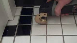 Removing a Broken Floor Tile with Dremel and ToolSnobcom [upl. by Eneliak289]