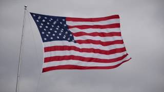 American flag flaps during heavy wind storm [upl. by Erdried]