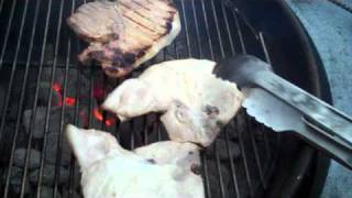 Grilled Pork Chops on a charcoal grill [upl. by Noskcaj]