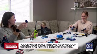 Police wives make ribbons as symbol of support for Sgt Bill Hoosers funeral [upl. by Heyra410]