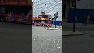 At Hyde Park Corner is Stagecoach London Scania 15035 suitabily liveried for the sightseeing tour [upl. by Lleruj]