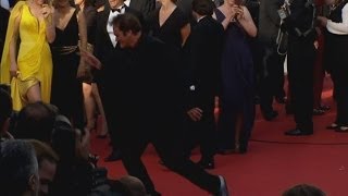 Quentin Tarantino dances on the red carpet as the cast of Pulp Fiction reunites in Cannes [upl. by Ahsitram783]