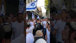 Group of Jews dancing with Israeli flags in the Muslim Quarter in Jerusalem Israel 2024 [upl. by Bevvy]