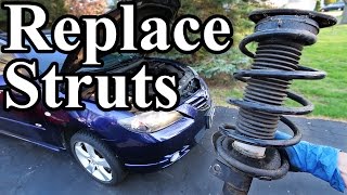 How to Replace Struts in your Car or Truck [upl. by Frendel532]