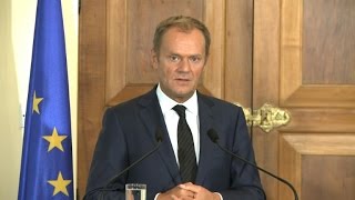 EUs Tusk ready to call summit if no refugee accord [upl. by Corilla929]