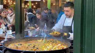 Borough Market in London is home to cuisines from around the world Welcome to the paella stall [upl. by Chickie]