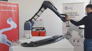 Smerigliare levigare o lucidare con cobot Doosan Robotics e Onrobot sender [upl. by Natfa862]