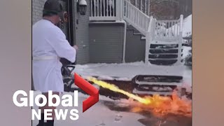 Kentucky man uses flamethrower to clear snow from driveway [upl. by Aticnemrac]