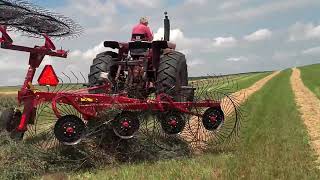 IH 856 raking hay w Case IH WR101 rake [upl. by Glassco]