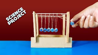 How to make Newtons cradle  Science project  DIY Newtons cradle from Cardboard [upl. by Adekahs]